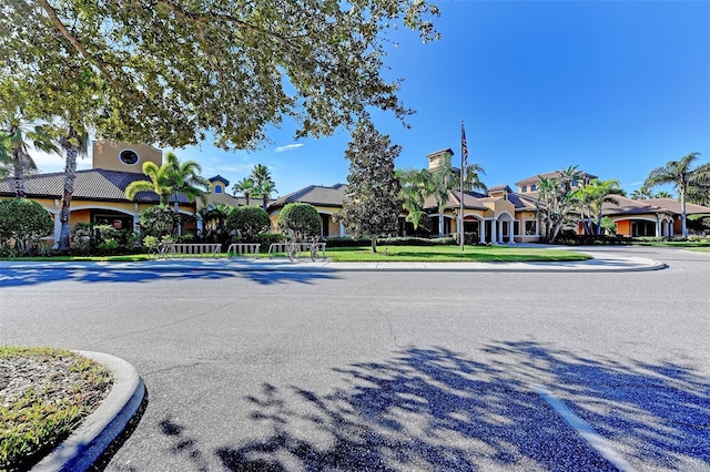 view of road featuring curbs
