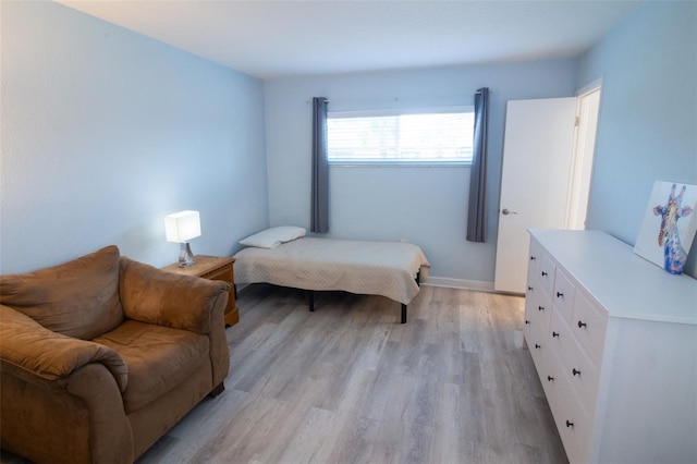 400 Base Unit 225, Venice, FL 34293 - bedroom with light wood-style flooring