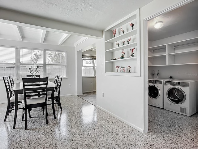2108 Lee Ln, Sarasota, FL 34231 - dining room featuring washer and dryer, baseboards, beam ceiling, dark speckled floor, and a textured ceiling