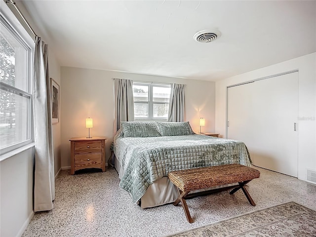2108 Lee Ln, Sarasota, FL 34231 - bedroom with speckled floor and baseboards