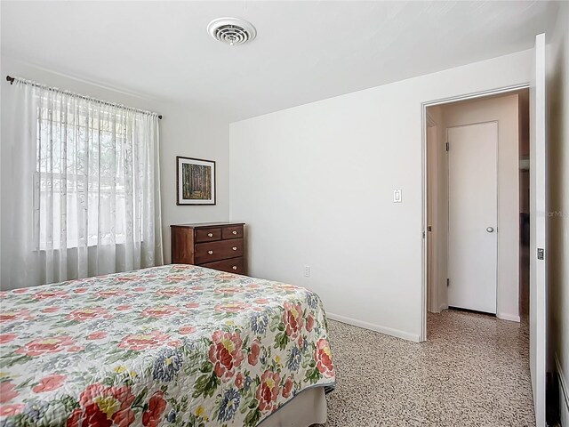 2108 Lee Ln, Sarasota, FL 34231 - carpeted bedroom with baseboards