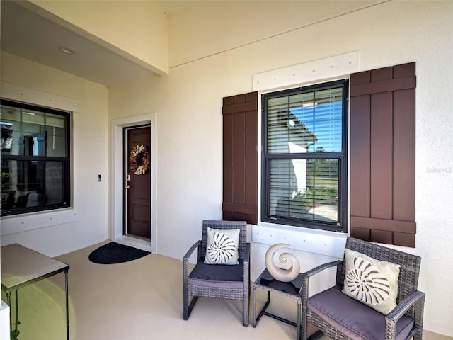220 Sarezzo Cir, Nokomis, FL 34275 - view of exterior entry featuring stucco siding