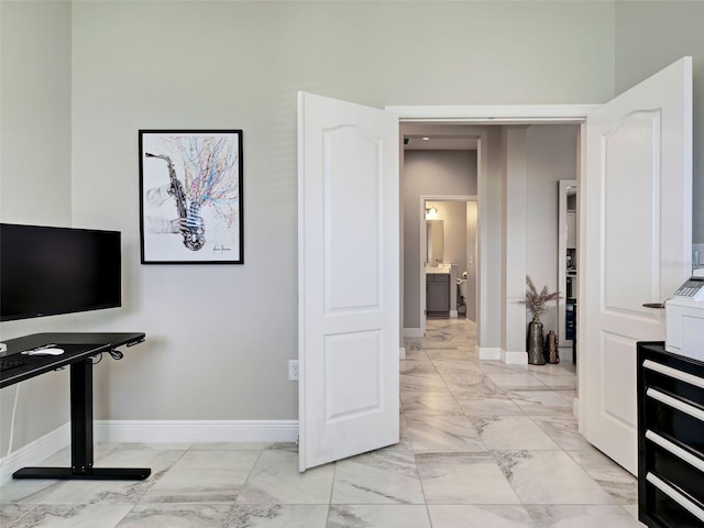 220 Sarezzo Cir, Nokomis, FL 34275 - hall with light marble finish flooring and baseboards