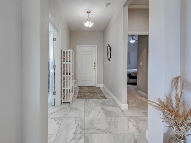 220 Sarezzo Cir, Nokomis, FL 34275 - entryway with light marble finish floors and baseboards