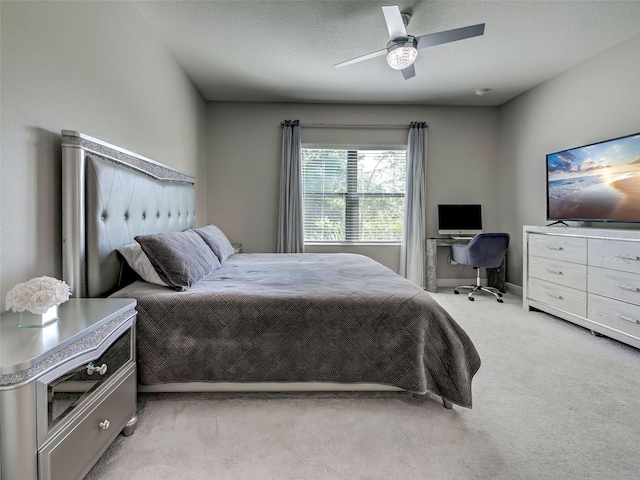 220 Sarezzo Cir, Nokomis, FL 34275 - bedroom featuring light carpet and a ceiling fan