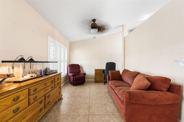 14124 Kewanee Ln, Port Charlotte, FL 33981 - living area featuring baseboards and light tile patterned flooring