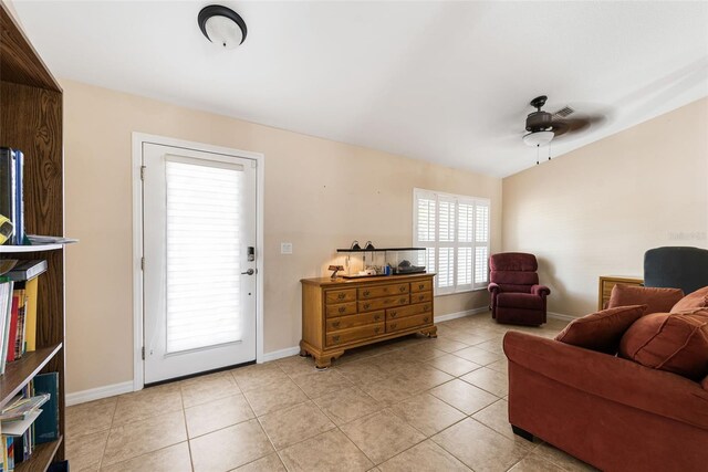 14124 Kewanee Ln, Port Charlotte, FL 33981 - interior space featuring baseboards, light tile patterned floors, and ceiling fan