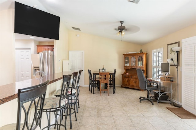 14124 Kewanee Ln, Port Charlotte, FL 33981 - home office featuring light tile patterned flooring, visible vents, ceiling fan, and baseboards