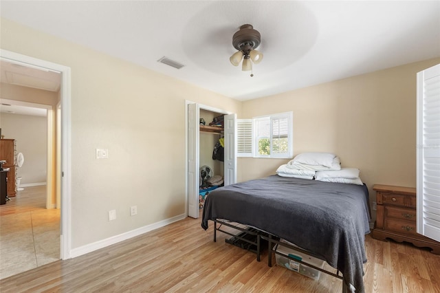 14124 Kewanee Ln, Port Charlotte, FL 33981 - bedroom with visible vents, baseboards, a closet, light wood-type flooring, and a ceiling fan