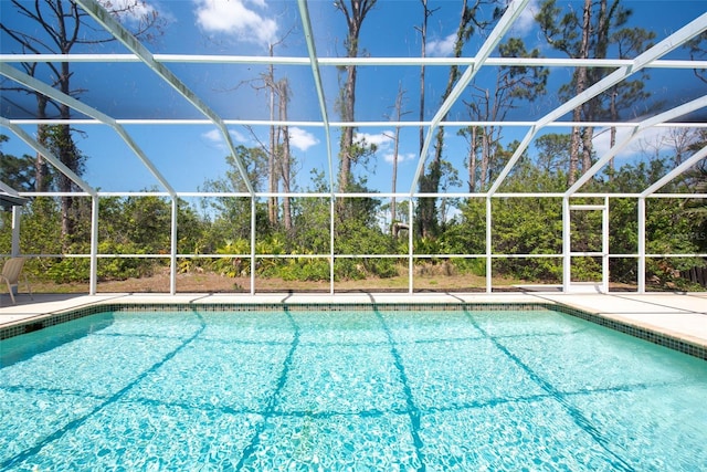 14124 Kewanee Ln, Port Charlotte, FL 33981 - outdoor pool featuring a patio and a lanai