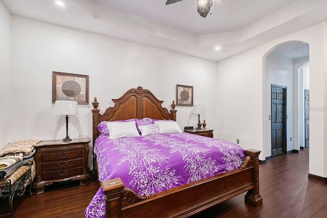 66 Statler St, Port Charlotte, FL 33954 - bedroom with arched walkways, ceiling fan, recessed lighting, and dark wood-style floors