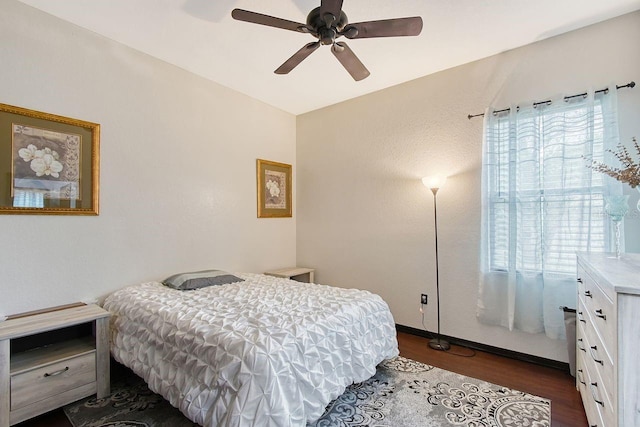 66 Statler St, Port Charlotte, FL 33954 - bedroom with ceiling fan and dark wood-style flooring