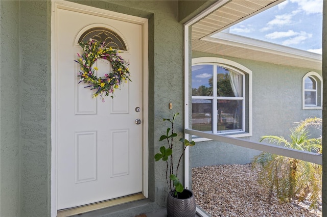 5264 Albion Rd, Venice, FL 34293 - entrance to property featuring stucco siding