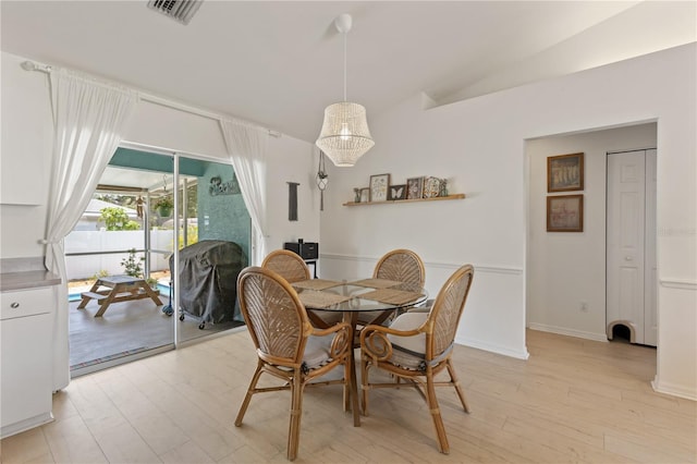 5264 Albion Rd, Venice, FL 34293 - dining room with visible vents and light wood-type flooring