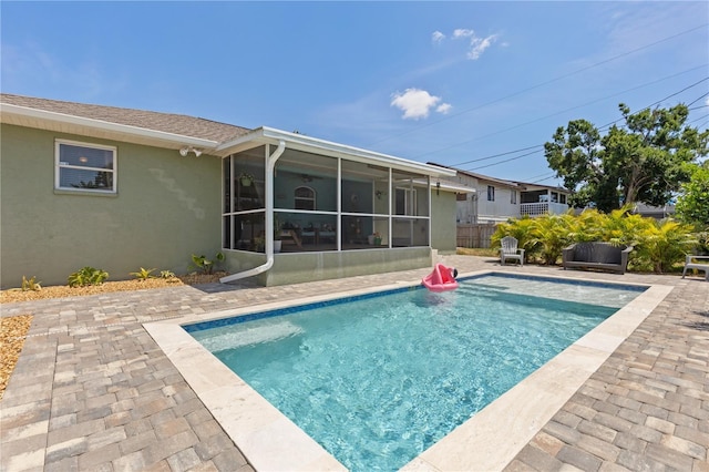 5264 Albion Rd, Venice, FL 34293 - view of pool with fence, a fenced in pool, a sunroom, and a patio area