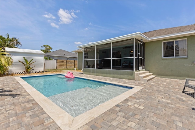 5264 Albion Rd, Venice, FL 34293 - pool with fence, entry steps, a sunroom, and a patio area