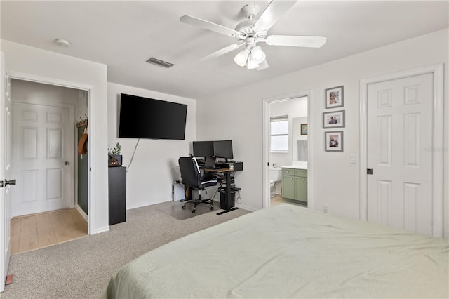 5264 Albion Rd, Venice, FL 34293 - bedroom with a ceiling fan, visible vents, baseboards, carpet floors, and ensuite bathroom