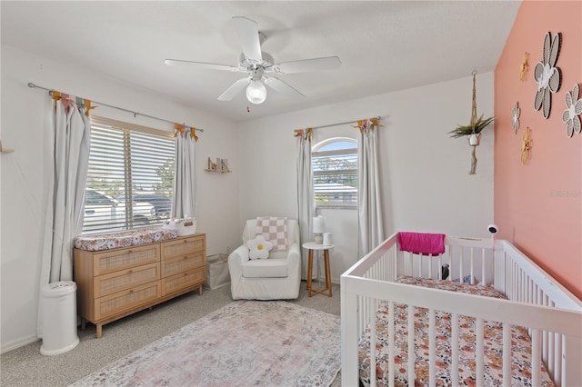 5264 Albion Rd, Venice, FL 34293 - bedroom featuring a ceiling fan, a nursery area, and light colored carpet