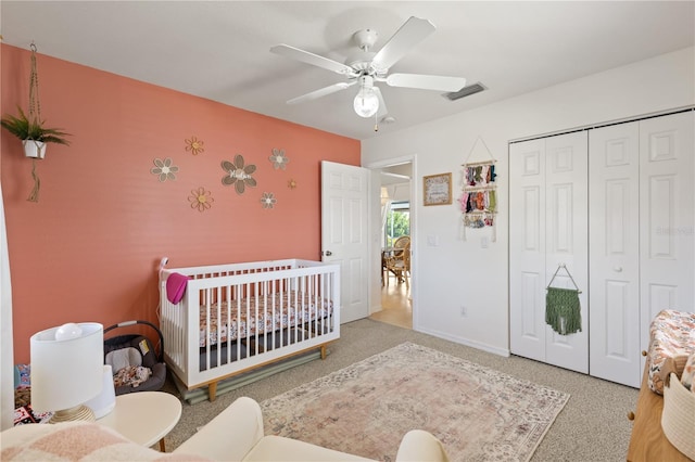 5264 Albion Rd, Venice, FL 34293 - bedroom featuring a crib, a closet, ceiling fan, baseboards, and visible vents