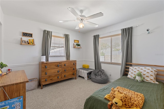 5264 Albion Rd, Venice, FL 34293 - bedroom featuring carpet flooring, multiple windows, and ceiling fan