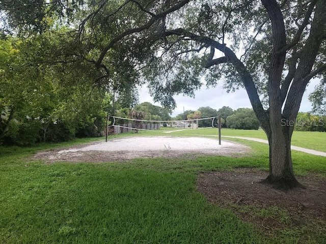 5264 Albion Rd, Venice, FL 34293 - view of property's community with volleyball court and a yard