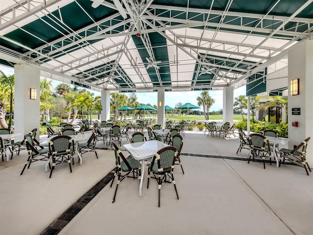 view of patio featuring a gazebo and outdoor dining area