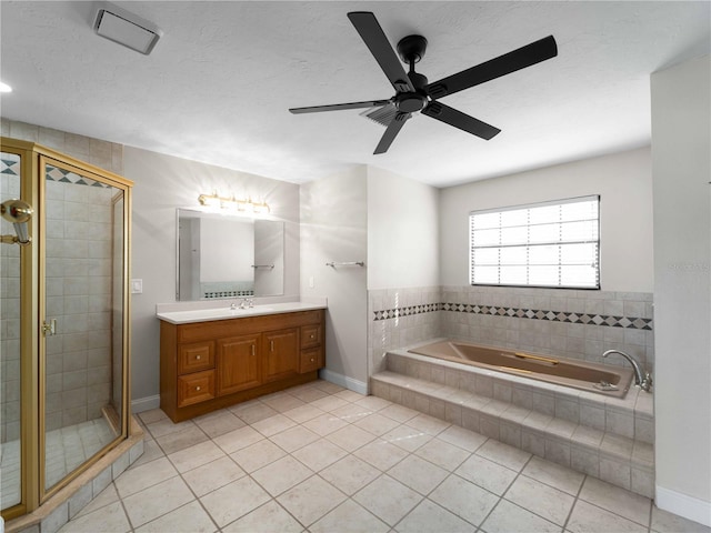 full bath with tile patterned floors, a shower stall, a bath, and vanity