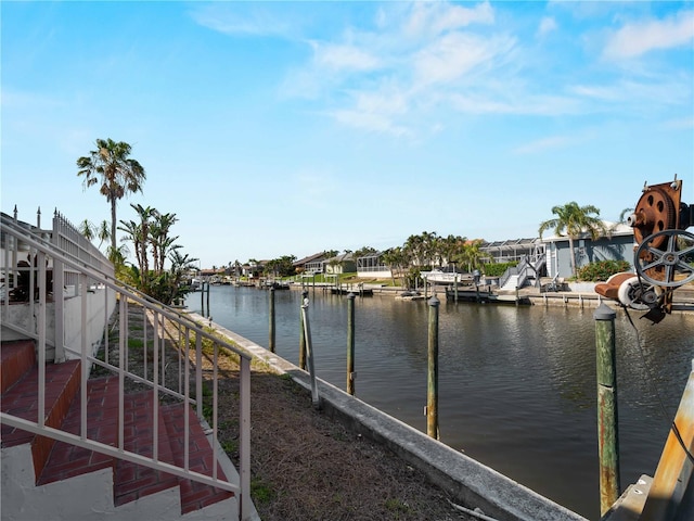 dock area with a water view