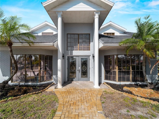 property entrance featuring french doors