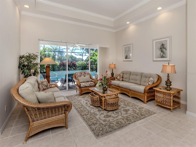 2022 Calusa Lakes Blvd, Nokomis, FL 34275 - tiled living room with ornamental molding, recessed lighting, a sunroom, and baseboards