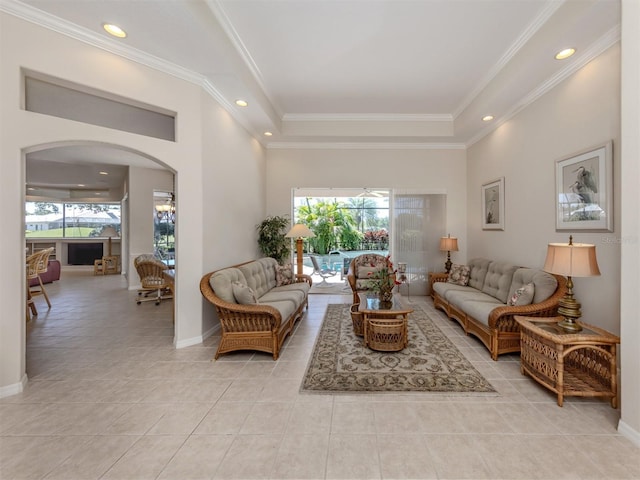 2022 Calusa Lakes Blvd, Nokomis, FL 34275 - living room featuring light tile patterned floors, recessed lighting, baseboards, and arched walkways