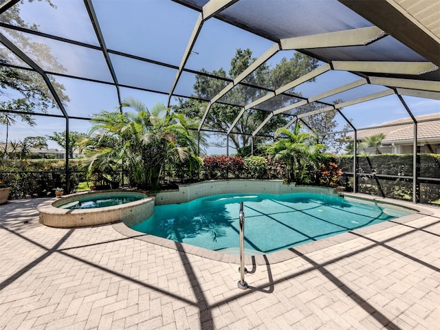 2022 Calusa Lakes Blvd, Nokomis, FL 34275 - view of pool with a pool with connected hot tub, a patio, and glass enclosure
