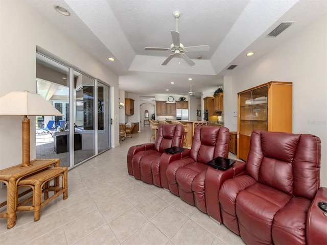 2022 Calusa Lakes Blvd, Nokomis, FL 34275 - living area with recessed lighting, light tile patterned flooring, ceiling fan, a raised ceiling, and visible vents