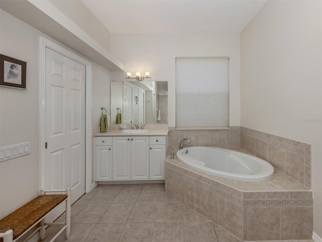 2022 Calusa Lakes Blvd, Nokomis, FL 34275 - bathroom featuring a garden tub, vanity, and tile patterned flooring