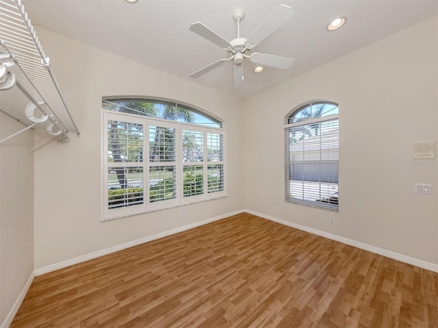 2022 Calusa Lakes Blvd, Nokomis, FL 34275 - spare room featuring recessed lighting, a ceiling fan, baseboards, and light wood-type flooring