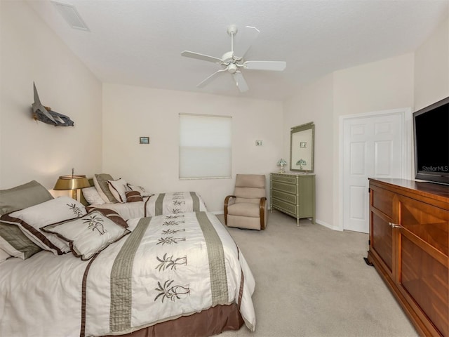 2022 Calusa Lakes Blvd, Nokomis, FL 34275 - bedroom with visible vents, ceiling fan, and light colored carpet