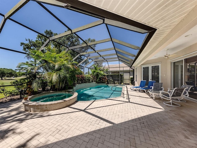 2022 Calusa Lakes Blvd, Nokomis, FL 34275 - view of swimming pool featuring a lanai, ceiling fan, a pool with connected hot tub, and a patio area