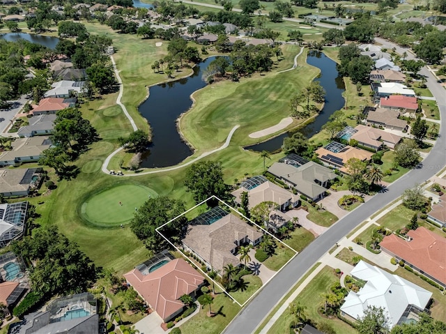 2022 Calusa Lakes Blvd, Nokomis, FL 34275 - bird's eye view featuring a water view, a residential view, and view of golf course