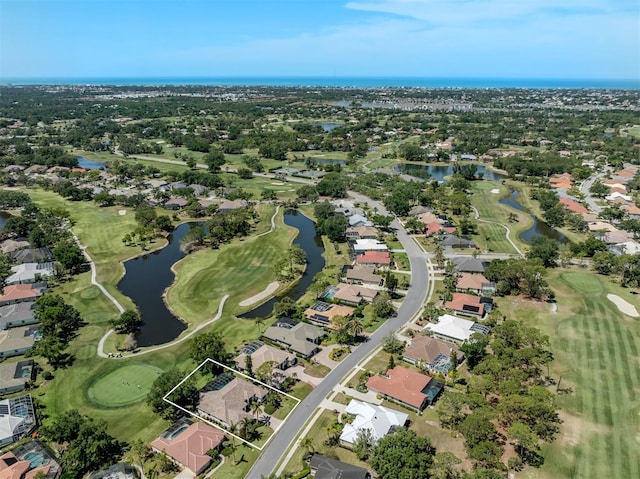 2022 Calusa Lakes Blvd, Nokomis, FL 34275 - birds eye view of property featuring golf course view, a residential view, and a water view