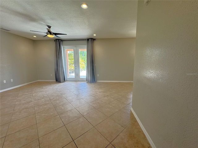 spare room with visible vents, baseboards, light tile patterned flooring, recessed lighting, and a ceiling fan