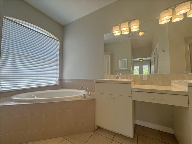 bathroom featuring plenty of natural light, a bath, and tile patterned flooring
