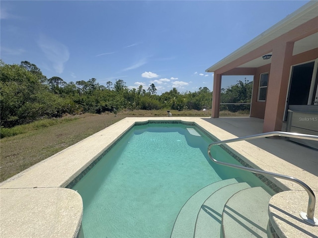 pool with a patio