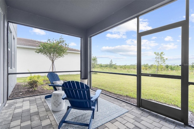 sunroom featuring a healthy amount of sunlight
