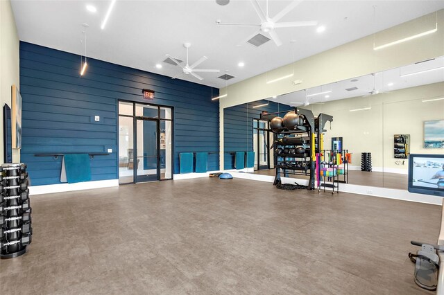 workout area featuring ceiling fan and visible vents