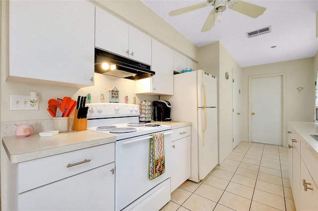 kitchen with white appliances, light countertops, white cabinetry, under cabinet range hood, and visible vents