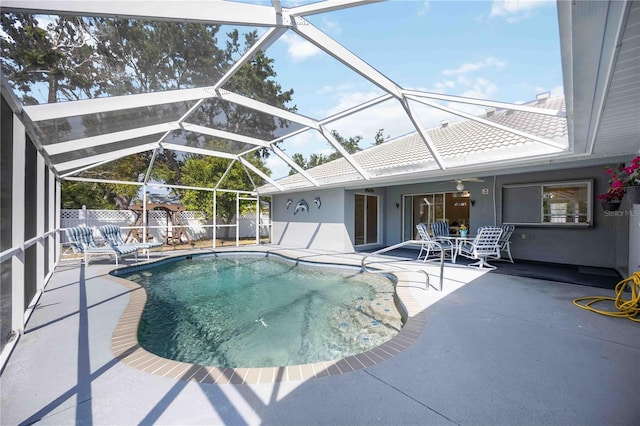 1568 Ringtail Rd, Venice, FL 34293 - view of swimming pool with a patio area, a fenced backyard, and a lanai