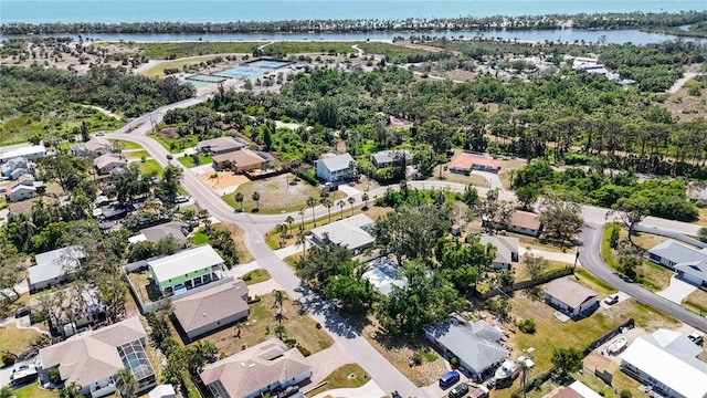 1568 Ringtail Rd, Venice, FL 34293 - aerial view of property and surrounding area with a large body of water and nearby suburban area