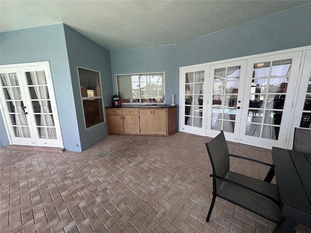 view of patio featuring french doors