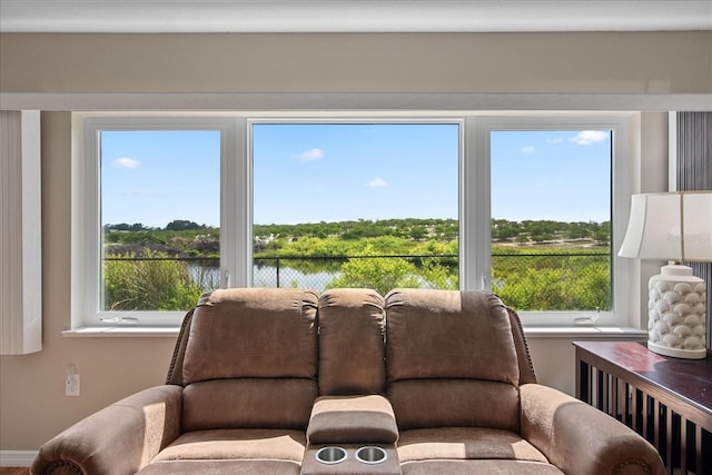 living room featuring a water view
