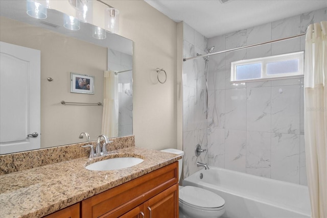 full bathroom with vanity, toilet, visible vents, and shower / tub combo with curtain